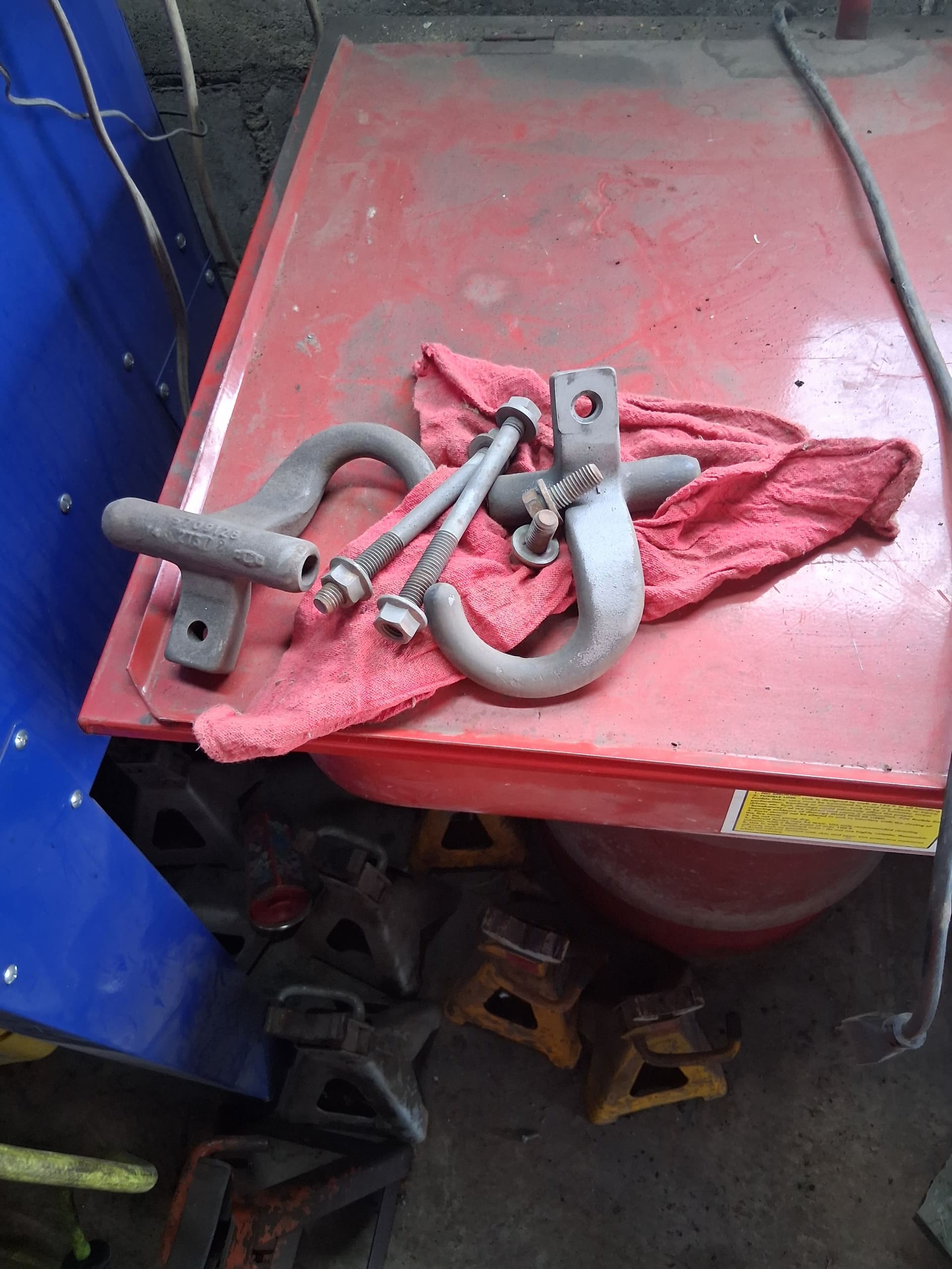 Red Powder Coat Finish on Chevy Tow Hooks image